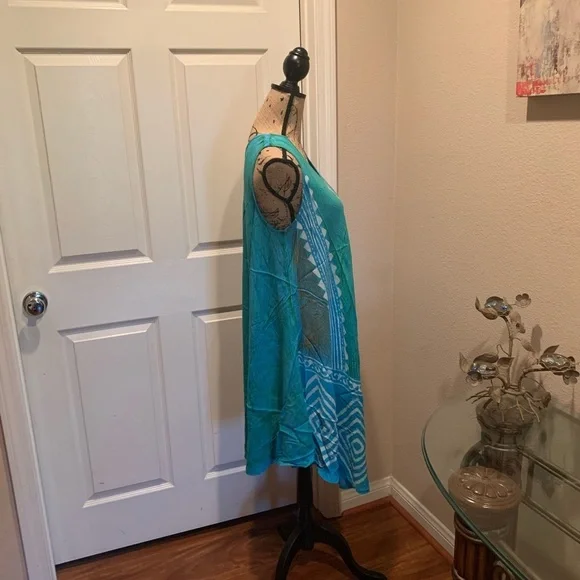 Multi colored print short umbrella dress. - Picture 3 of 5